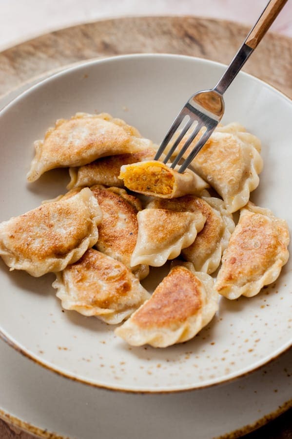 Vegan pierogi with spicy red lentil and sun-dried tomato filling